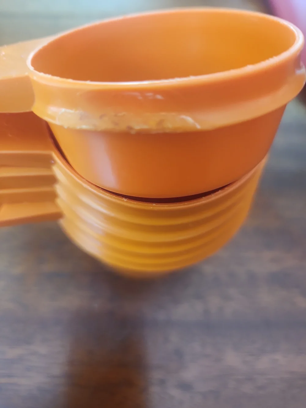 TupperwareOrange Plastic Measuring Cups Plus Other Helpful Kitchen Items